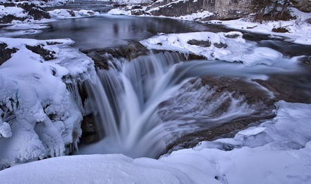 Elbow Falls Bragg Creek Alberta Canada in Winterの写真素材