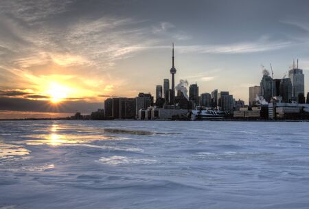 Toronto Ontario from Polson Pier in Winter at sunsetの写真素材