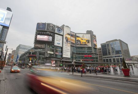 Dundas Square Yonge Street Toronto busy intersectionのeditorial素材