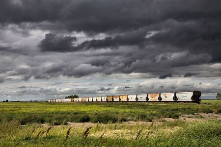 Storm Clouds Saskatchewan Prairie scene trainのeditorial素材