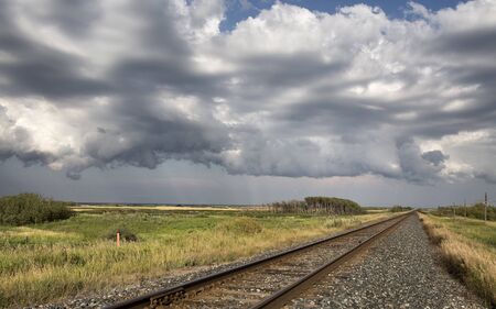 Storm Clouds Saskatchewan Prairie scene Train Tracksの写真素材