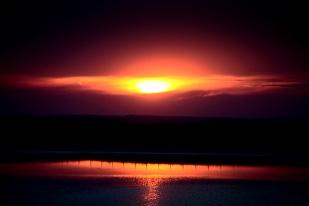 Prairie Sunset Canada in Saskatchewan Water Reflectionの写真素材