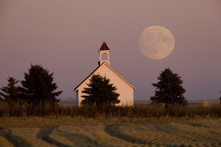 Old Country Church in Saskatchewan full harvest moonの写真素材