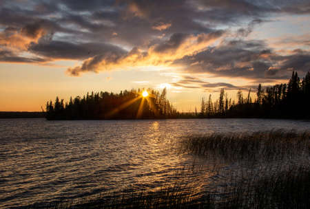 The Narrows Waskesiu sunset Northern lake Wildernessの写真素材