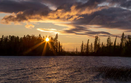 The Narrows Waskesiu sunset Northern lake Wildernessの写真素材