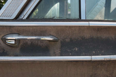 close up of a door buckle of an old rusty carの写真素材