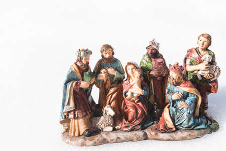 Nativity figures holy family with the three kings on white background