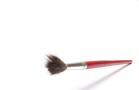 Close up of one hair brush as concept painting and art isolated on white backgroundの写真素材