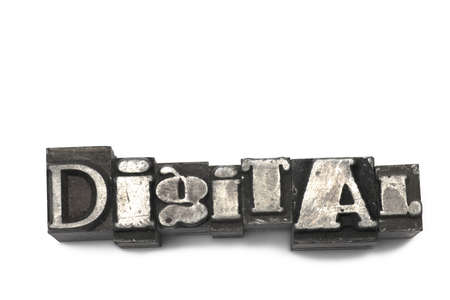 Close up on printer lead letters showing word digital with different letter shapes on white background concept for digitization and digital contentの写真素材