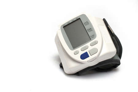Close up of professional digital blood pressure monitor with several buttons and a big lcd screen...