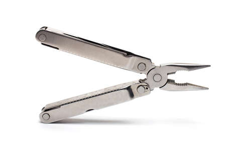Close-up of combination pliers of a jackknife pocket knife on a white background
