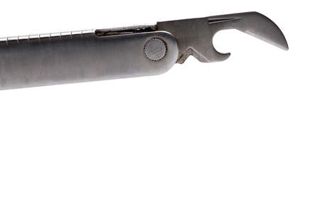 Close up of a folding basic can opener of a jackknife pocket knife multi tool on a white background