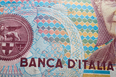 Macro partial close up vintage old obsolete italian lire bill banknote visible inscription banca...