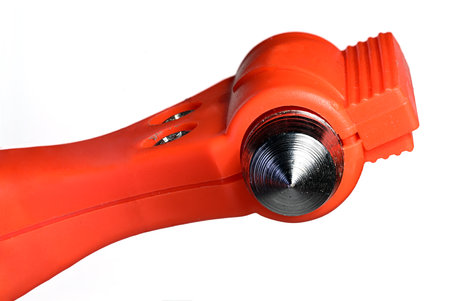Partial view of sharp metal tip of distress hammer as concept for emergency exit in case of disasterの写真素材