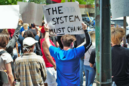 Dayton, Ohio, United States 05/30/2020 protesters at a black lives matter rally marching down the...