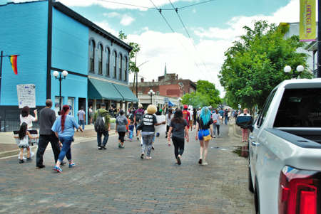 Dayton, Ohio, United States 05/30/2020 protesters at a black lives matter rally marching down the street holding signs and wearing masksのeditorial素材
