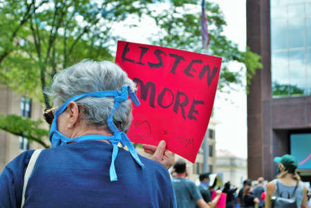 Dayton, Ohio, United States 05/30/2020 protesters at a black lives matter rally marching down the street holding signs and wearing masksのeditorial素材