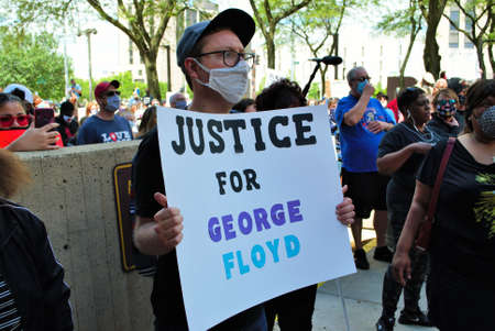 Dayton, Ohio, United States 05/30/2020 protesters at a black lives matter rally marching down the...