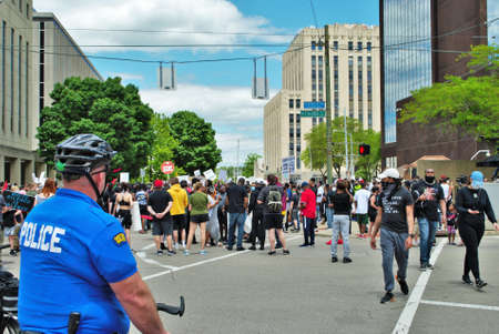 Dayton, Ohio United States 05/30/2020 police officers controlling the crowd at a black lives matter...