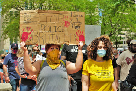 Dayton, Ohio, United States 05/30/2020 protesters at a black lives matter rally marching down the...