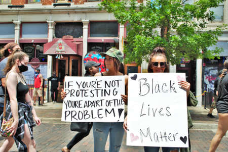 Dayton, Ohio, United States 05/30/2020 protesters at a black lives matter rally marching down the...