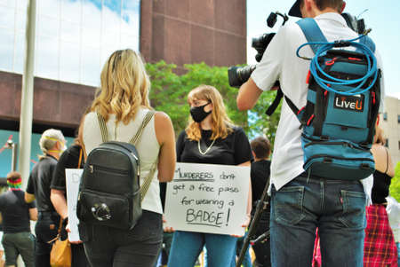 Dayton, Ohio, United States 05/30/2020 protesters at a black lives matter rally marching down the...