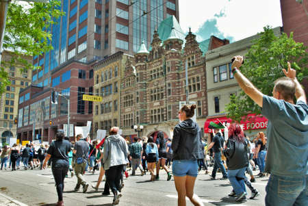 Dayton, Ohio, United States 05/30/2020 protesters at a black lives matter rally marching down the...