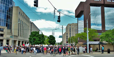Dayton, Ohio, United States 05/30/2020 protesters at a black lives matter rally marching down the street holding signs and wearing masksのeditorial素材
