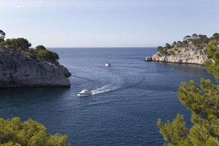 Boat on the blue sea of Calanques in Franceの写真素材