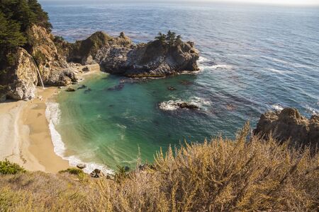 View on bay with waterfall at Big Sur, California, USAの写真素材