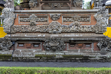 Ancient stone reliefs in balinese temple, Indonesiaの写真素材