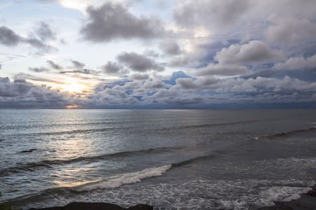Sunset on Tanah Lot temple on Bali, Indonesiaの写真素材