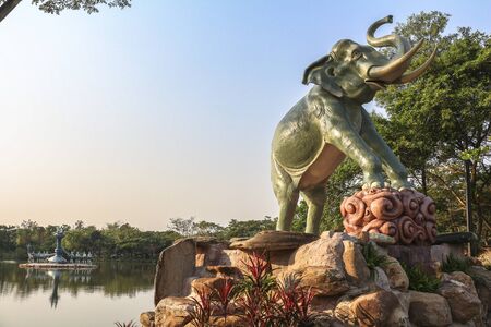 Thai sculpture on lake in ancient city near Bangkok in Thailandの写真素材