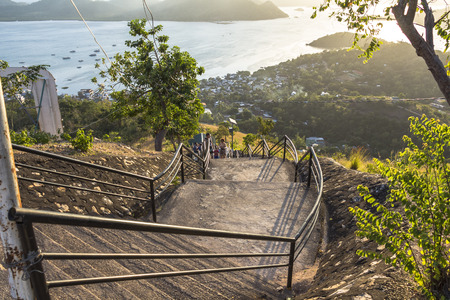 Steep stairs downhill with view over Coronの写真素材