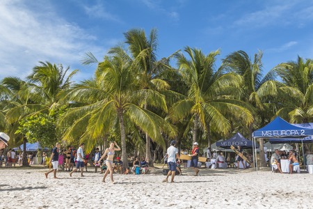 Perfect tourist beach with palm trees on philippine islandの写真素材
