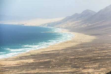 View over endless Cofete beach on Fuerteventura islandの写真素材