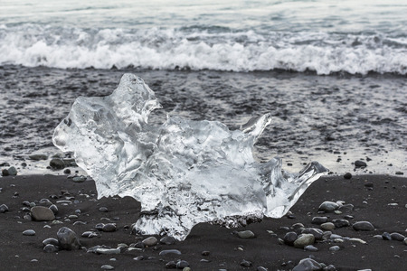 Crystal ice on black diamond beach, Iceland