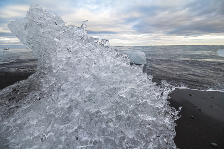 Crystal ice on black diamond beach, Iceland
