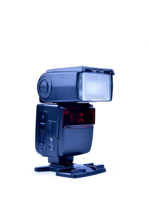 black external flash on a white screenの写真素材