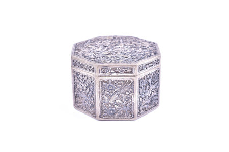 old beautiful silverware on a white screenの写真素材