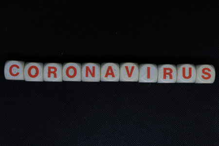 "CORONAVIRUS" written on a black backgroundの写真素材