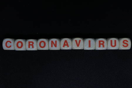 "CORONAVIRUS" written on a black backgroundの写真素材