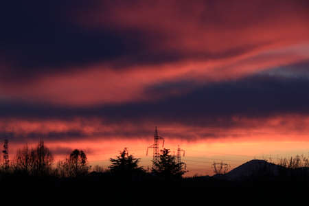 An orange sunset in the backgroundの写真素材