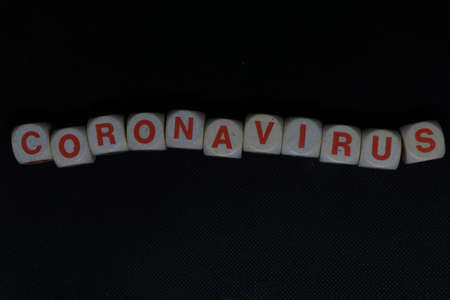 "CORONAVIRUS" written on a black backgroundの写真素材