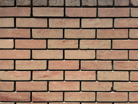 Brick wall texture, closeup of an old exterior surface as a background. Building face wall, convex...