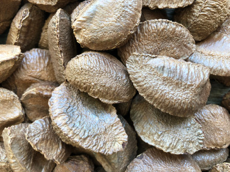 Brazilian nut. Close-up of a group of Brazil nuts as a background. Food background. Biological food.