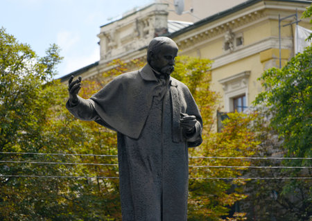 Lviv, Ukraine, statue of Taras Shevchenko- famous Ukrainian poet, artist, with a 12-meter decorative stele with reliefs located on prospect Svobody in Lvivの写真素材