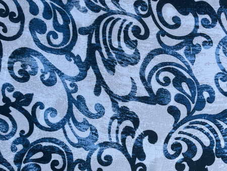 Frost pattern fabric, close-up as texture. Cotton or linen textile with scattered blue patterns. Bright frosty background. New Year backgroundの写真素材