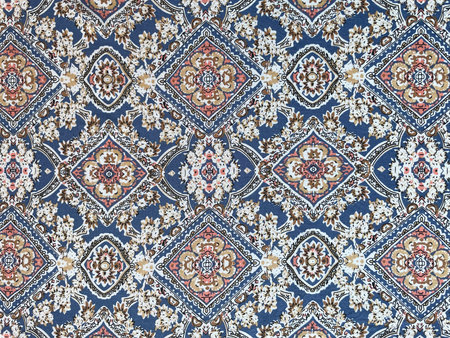 Fabric with scattered patterns, close-up as a texture. Cotton or linen fabric. Bright background with small elements.の写真素材