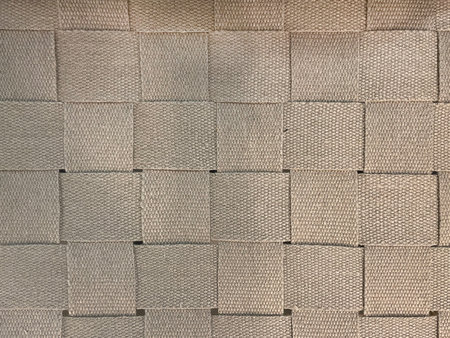 Beige woven textile texture with square basket weave pattern. Natural fabric surface, neutral...